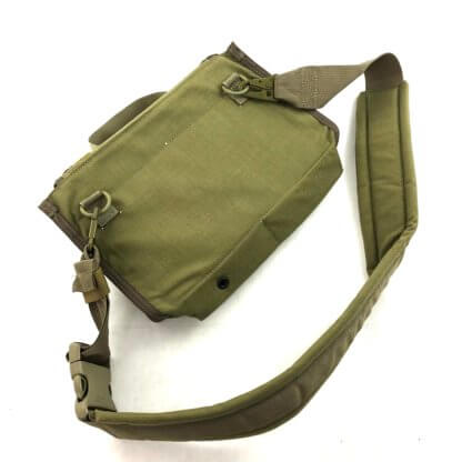 You can carry the bag by the handle on the top as well as wear it over your shoulder. 