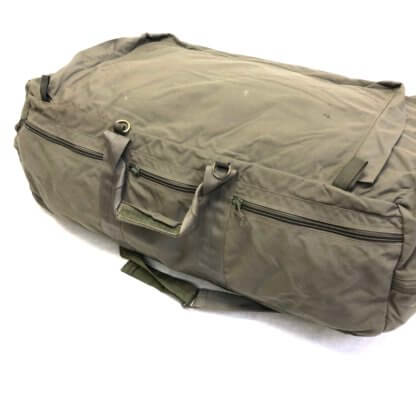 You easily access the main compartment through a top zippered flap. Also, you can use five exterior zippered pockets for extra organization.